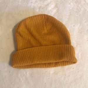 A mustard beanie